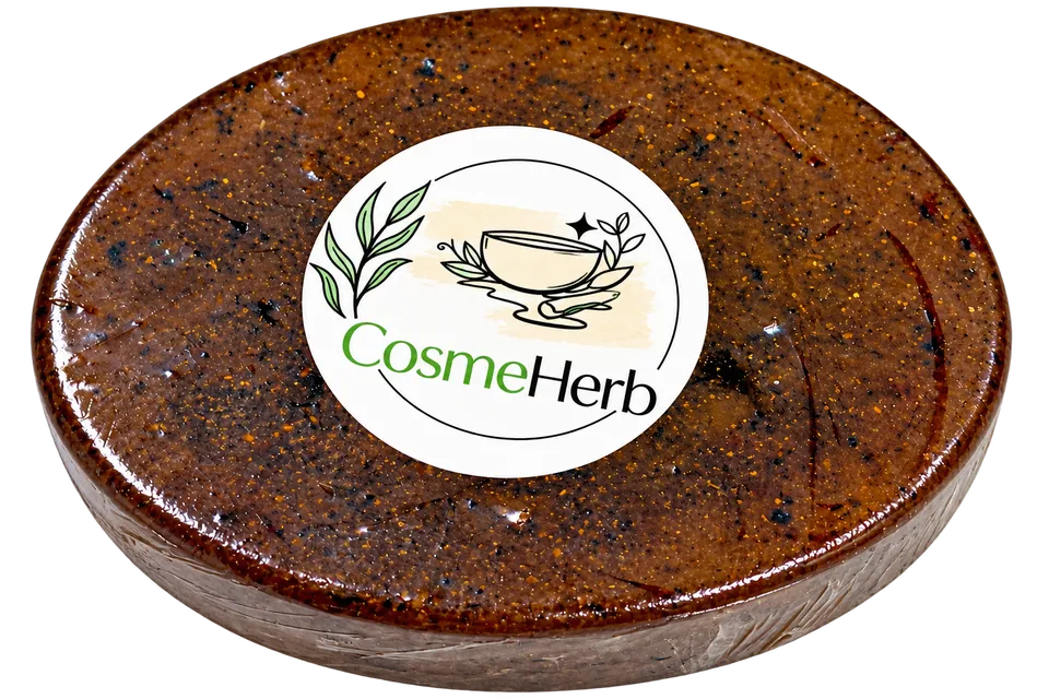 Top view of the oval dark brown herbal soap with a round Cosmeherb sticker.